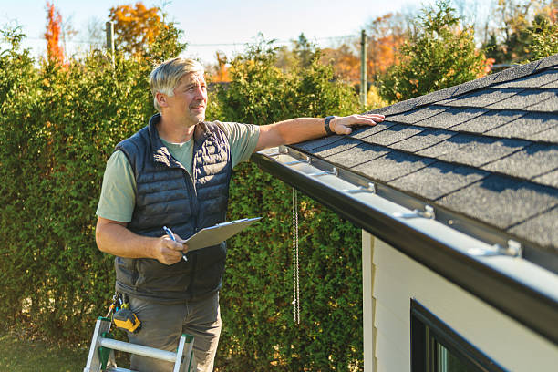 Professional Metal Roofing technician working in Eckert, CO